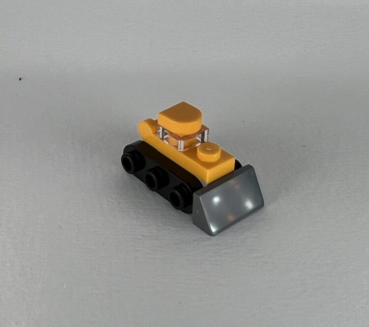 A LEGO micro bulldozer